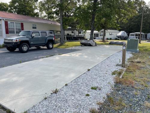 Lot 61 $125,000.00 Lot with FEMA pad and patio with electric golf cart